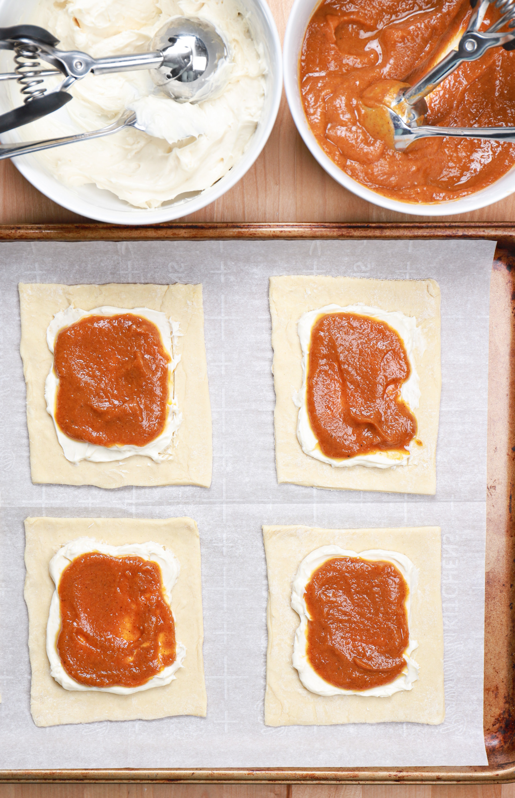 Overhead view of the pumpkin cream cheese danishes before going into the oven.