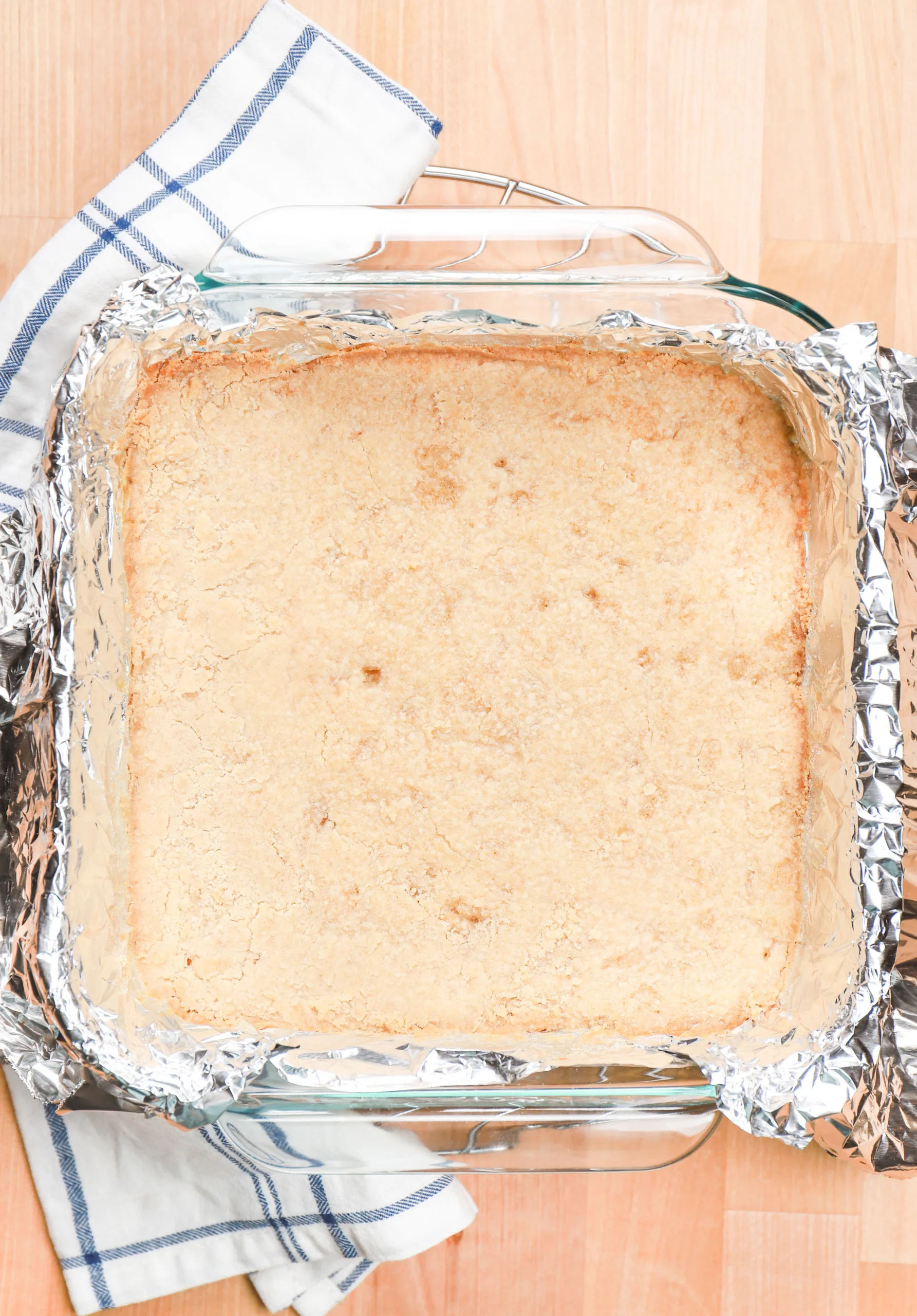 Overhead view of maple pecan pie bars before the filling is added.