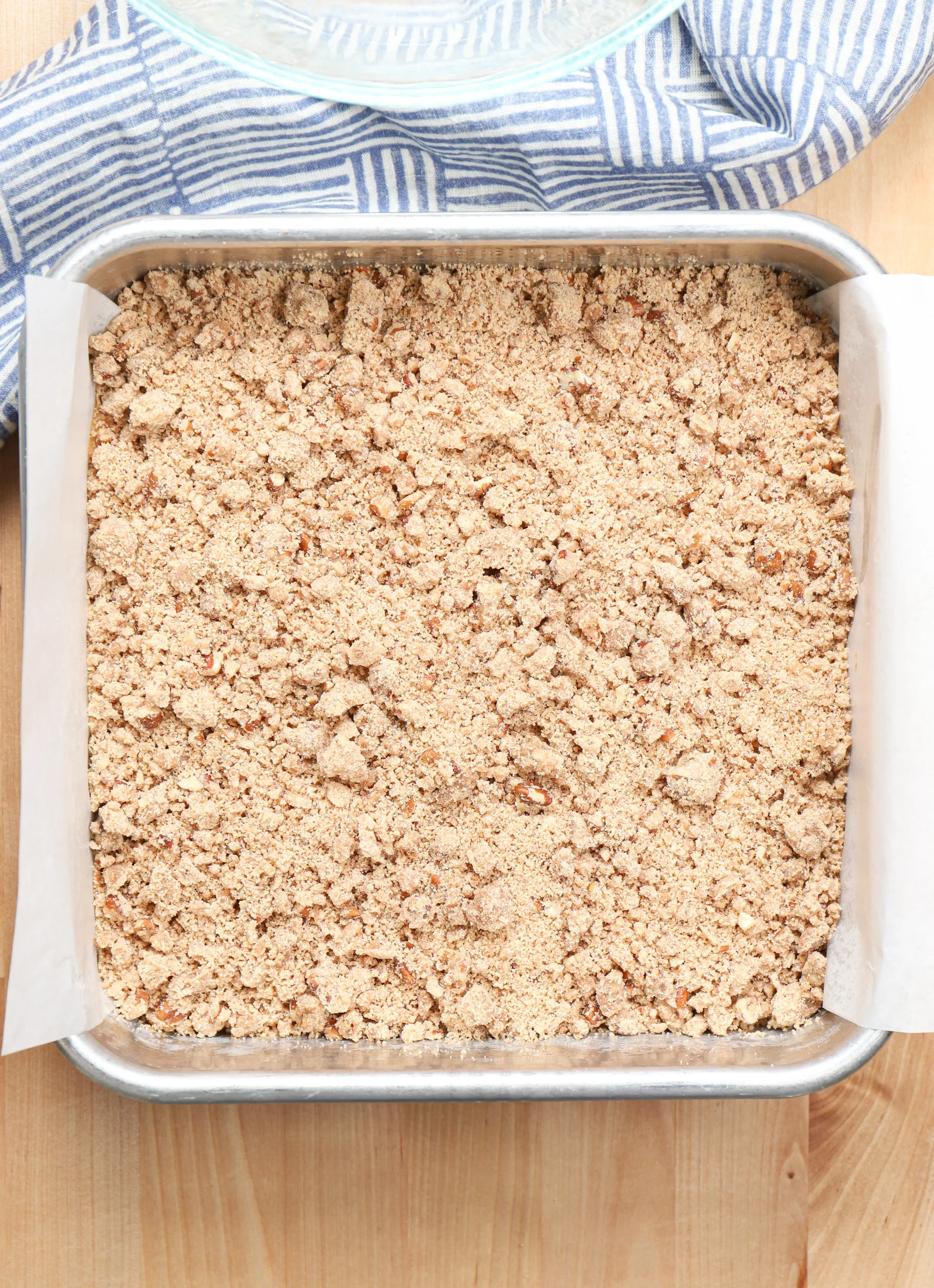 Overhead view of a pan of carrot cake coffee cake right before baking.