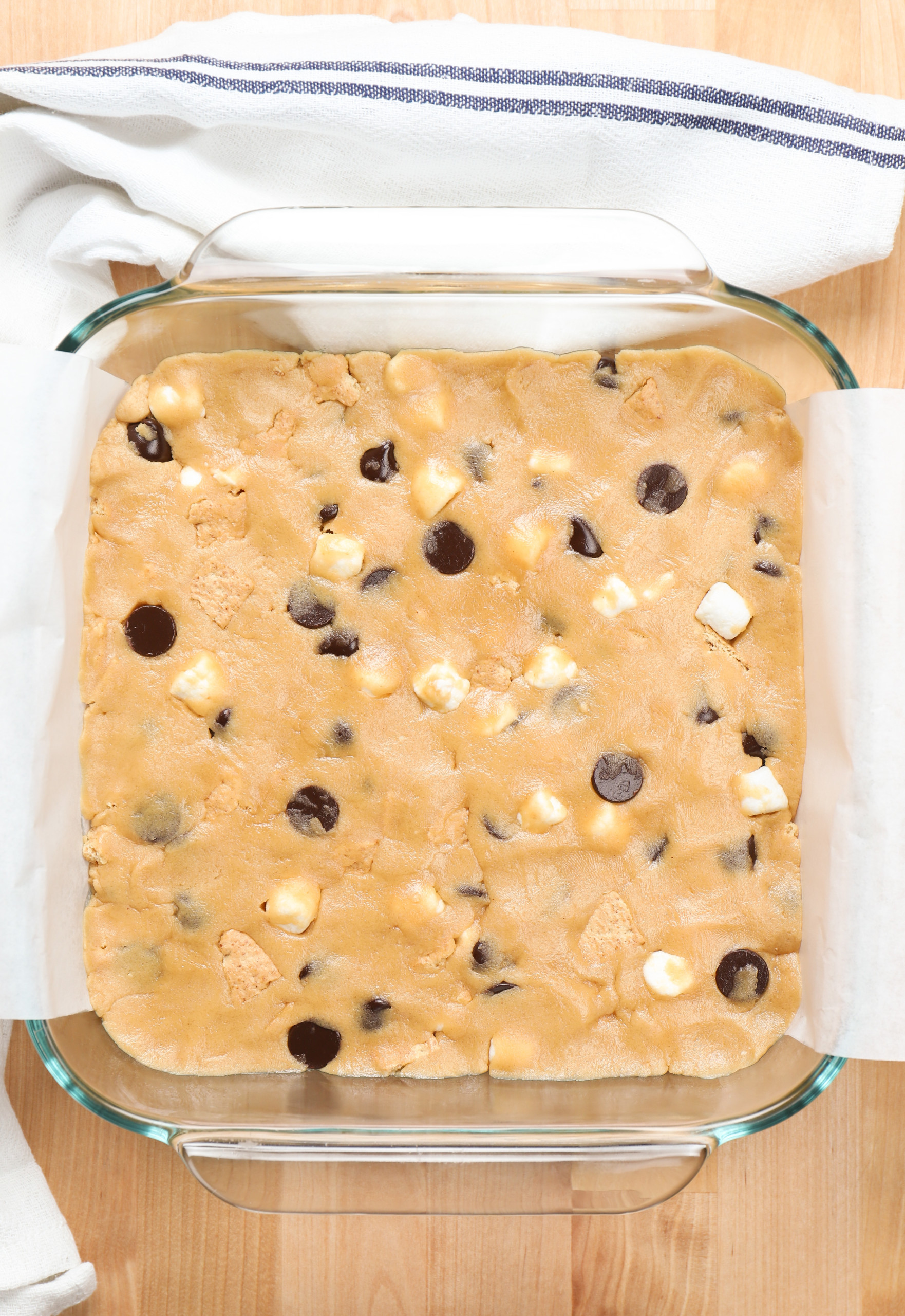 Overhead view of a pan of peanut butter smores bars before baking.